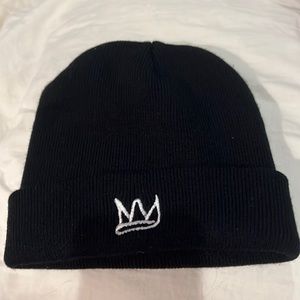 Black knit beanie with embroidered crown